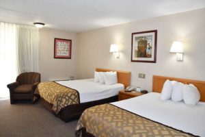 spacious room with two double beds at Reagan Inn Gatlinburg Tennessee